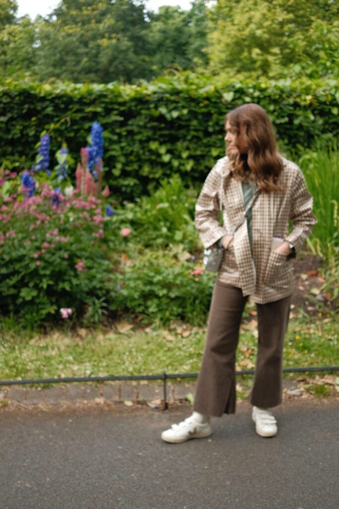 Stroling in St. Stephen's Green, Dublin, Ireland, surrounded by vibrant greenery and flowers.