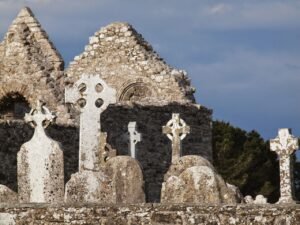 Historic ruins of Clonmacnoise Monastic Site along the River Shannon, a must-see stop on the scenic drive from Dublin to Galway, showcasing early Christian history and Irish heritage.