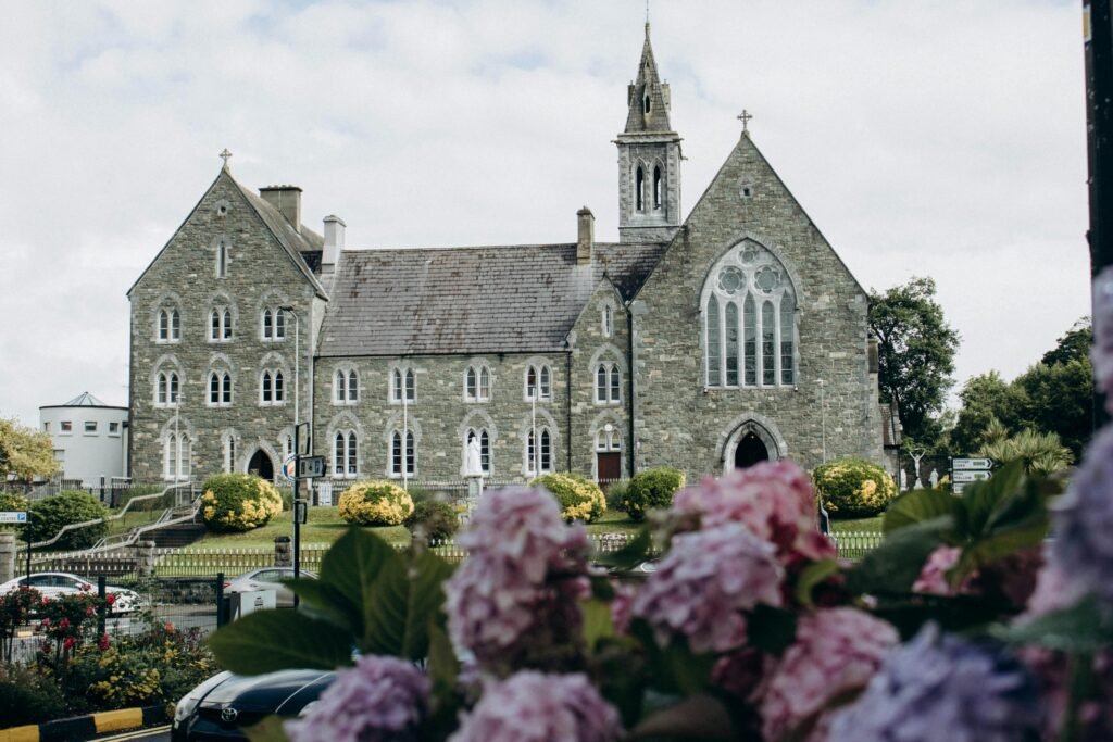 St. Mary’s Cathedral in Killarney, Ireland, an impressive neo-Gothic church featuring stunning architecture and tall spires. Located near Killarney National Park, this historic landmark is a must-see attraction in County Kerry, known for its beautiful stained glass windows and tranquil surroundings.